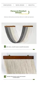 Detail of hand woven bohemian wall tapestry with gradient fringe and solid wood hanging bar
