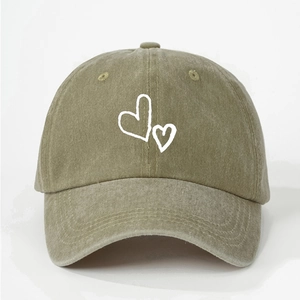 Olive green washed cotton baseball cap with white double heart embroidery for women