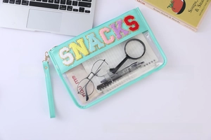 Transparent mint green PVC bag with colorful chenille SNACKS patch embroidery and stationery