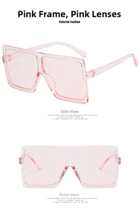 Detail view of pink square oversized sunglasses with transparent frames and matching lenses