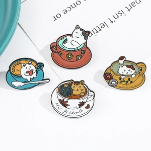 Detail of four enamel pins showing cute cats and rabbits in colorful coffee cups