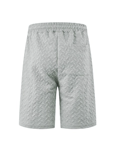 Detail of grey men's shorts showing rear view with pocket and jacquard herringbone texture