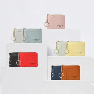 Slim Saffiano leather card holder with multiple slots and gold keychain in various colors