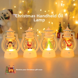 Detail of four white LED Christmas lanterns with festive Santa and snowman patterns