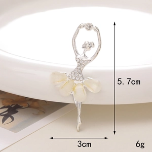 Macro shot of silver ballerina brooch with opal skirt and white rhinestones, 5.7x3cm detail