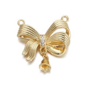 Detailed view of 18K gold plated butterfly charm with small bell and clear zircon stones