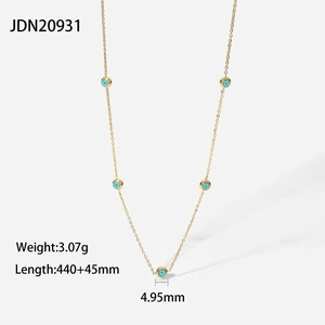 Detailed view of 18K gold plated necklace with turquoise beads and size specifications