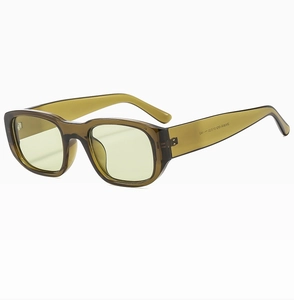 Detail view of olive green retro square frame sunglasses with yellow tinted lenses