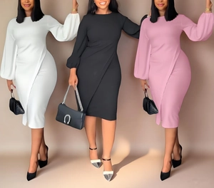 Detail view of lantern sleeves and side slit on white black and pink slim midi dresses