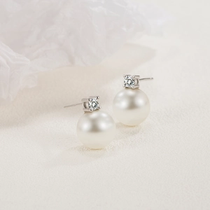 Elegant S925 sterling silver stud earrings with round white pearl and sparkling zircon