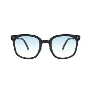 Foldable sunglasses with black frame and gradient blue lenses on white background
