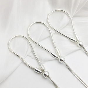 Detailed view of adjustable silver snake bone chains with sliding beads on silk