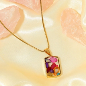 Luxurious gold snake chain necklace featuring a colorful crushed stone pendant on satin