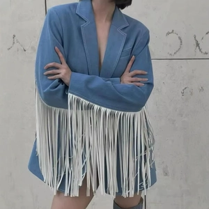 French style blue wool coat with fringe trim and notched lapels worn as a dress