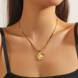 Gold-plated stainless steel sunflower necklace with pearl center on sleek snake chain