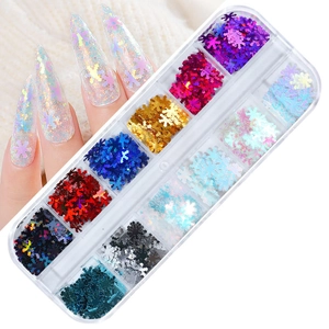 12-color snowflake nail glitter set with laser holographic effect in a 12-grid organizer