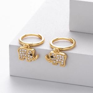 Detail view of gold S925 silver elephant hoop earrings with sparkling zircon inlay