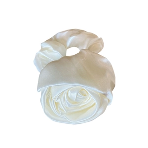 Elegant white satin rose flower hair tie with a lustrous finish and French style