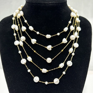 Elegant multi-layer gold titanium steel necklace with white pearls and heart charms