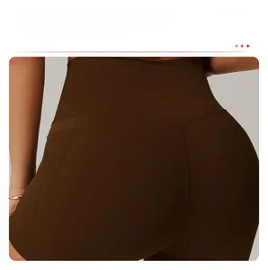 Detail of high-waisted yoga shorts with V-shaped stitching for bum lifting effect