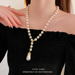 French vintage Y-shaped pearl necklace with diamond accents and gold waterdrop pendant