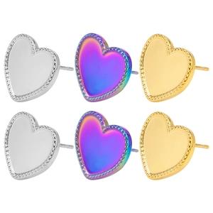 Detailed view of heart-shaped steel stud earrings in silver, gold, and rainbow finishes