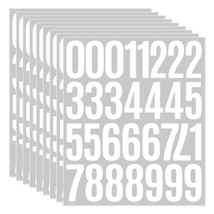 Detail view of 2-inch waterproof vinyl number stickers with white digits on grey background