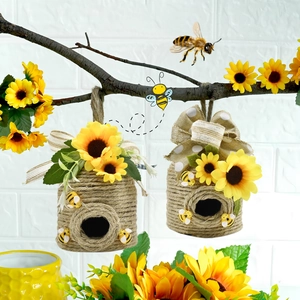 Hanging woven jute beehives with sunflowers and bees for Easter and garden decoration