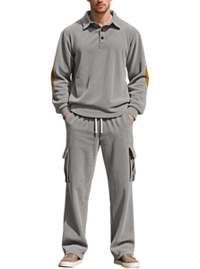 Detail of light gray corduroy long sleeve polo set with yellow elbow patches