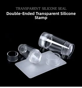 Close-up of dual-head transparent silicone nail stamper with scraper for manicure art