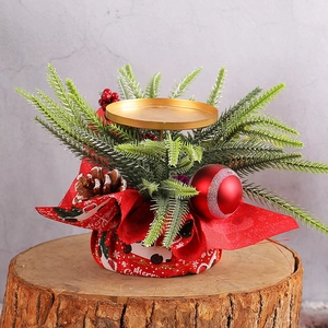 Christmas candle holder with red berries, pine cones and Merry Christmas gold base