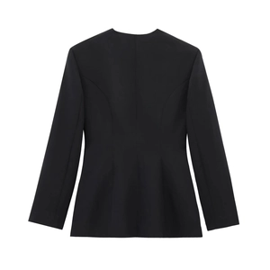 Detail showing the slim-fit back profile of a black belted blazer with structured shoulders