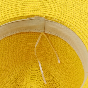 Yellow straw jazz hat for sun protection with internal adjustable drawstring and sweatband