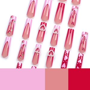 Pink French fake nails with 3D pearl hearts and cute strawberry designs for Valentine