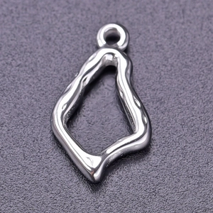 Macro shot of an irregular geometric 304 stainless steel pendant with silver metallic luster