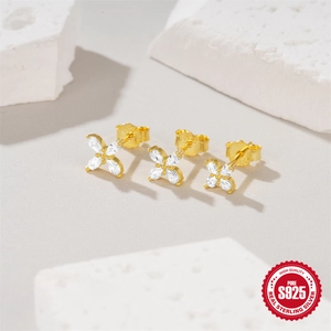 Elegant S925 sterling silver four-leaf clover stud earrings with sparkling white zircons