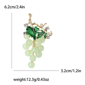 Creative grape brooch with green enamel leaves, clear beads, and sparkling crystals
