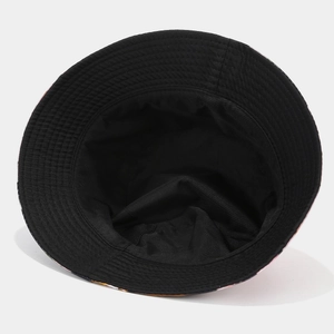 Black reversible sun bucket hat with reinforced stitching and colorful pattern edge