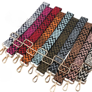 Adjustable wide replacement bag strap with colorful geometric patterns and gold clips