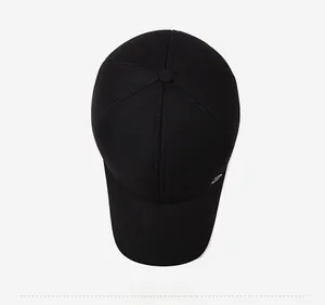 Top down view showing the textured wool fabric and crown construction of the men's winter cap