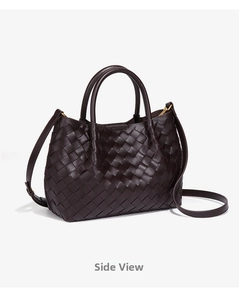 Detailed side view of the dark brown hand-woven leather tote showing intricate craft
