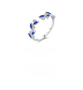 Close-up of S925 sterling silver leaf ring with blue marquise cut gems and adjustable band