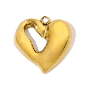 Detailed view of a heart-shaped gold pendant with a polished finish and fluid lava design