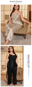 Detail showing the champagne satin camisole set with silky fabric and elegant drape