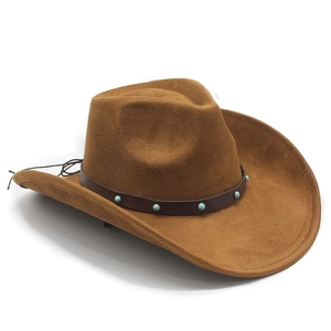 Detail of caramel brown suede cowboy hat with turquoise-studded leather band