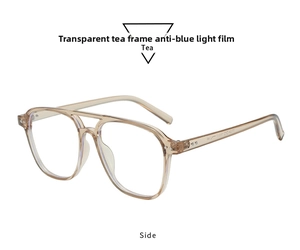 Detail view of tea-colored pilot frames with anti-blue light lenses and metal rivets