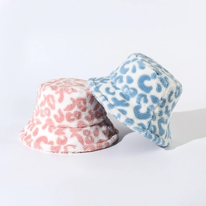 Plush faux fur leopard print bucket hats in pink and blue colors for autumn and winter