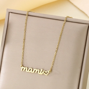 Close-up of 18K gold-plated mama necklace with mami letter pendant and heart detail