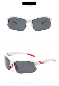 Detail view of sports sunglasses with white frames, red non-slip pads and grey lenses