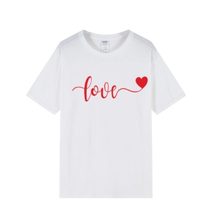 White cotton t-shirt with red love script and heart print on a clean white background